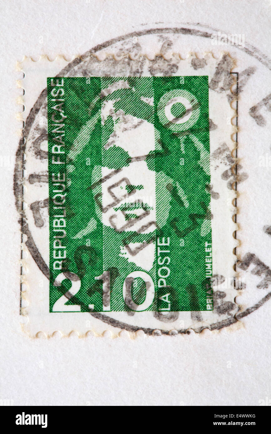French stamp stuck on postcard Stock Photo