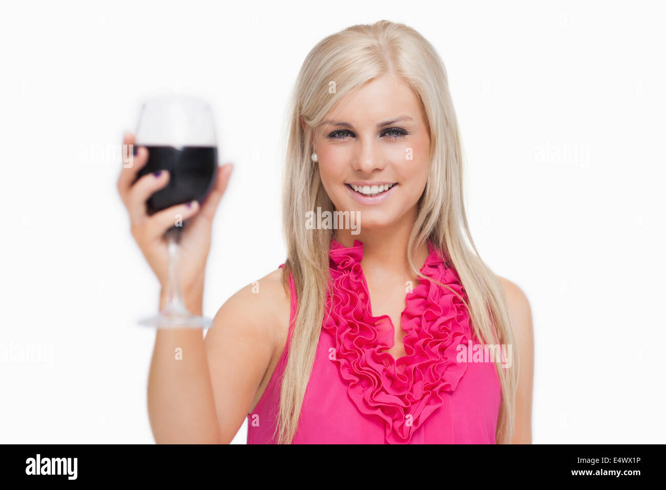Blonde holding a glass of wine Stock Photo - Alamy