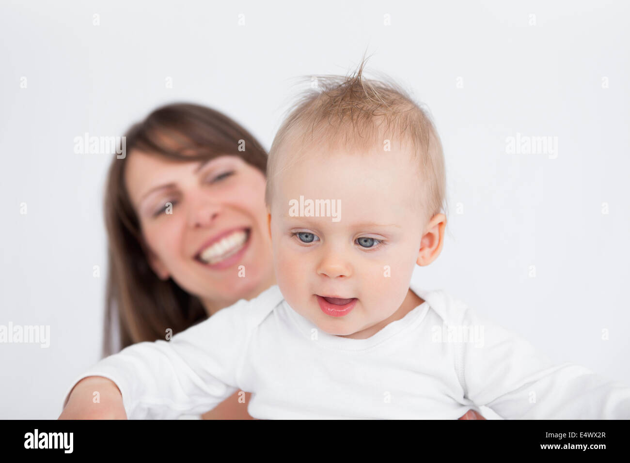 Cute baby holding blue hi-res stock photography and images - Alamy