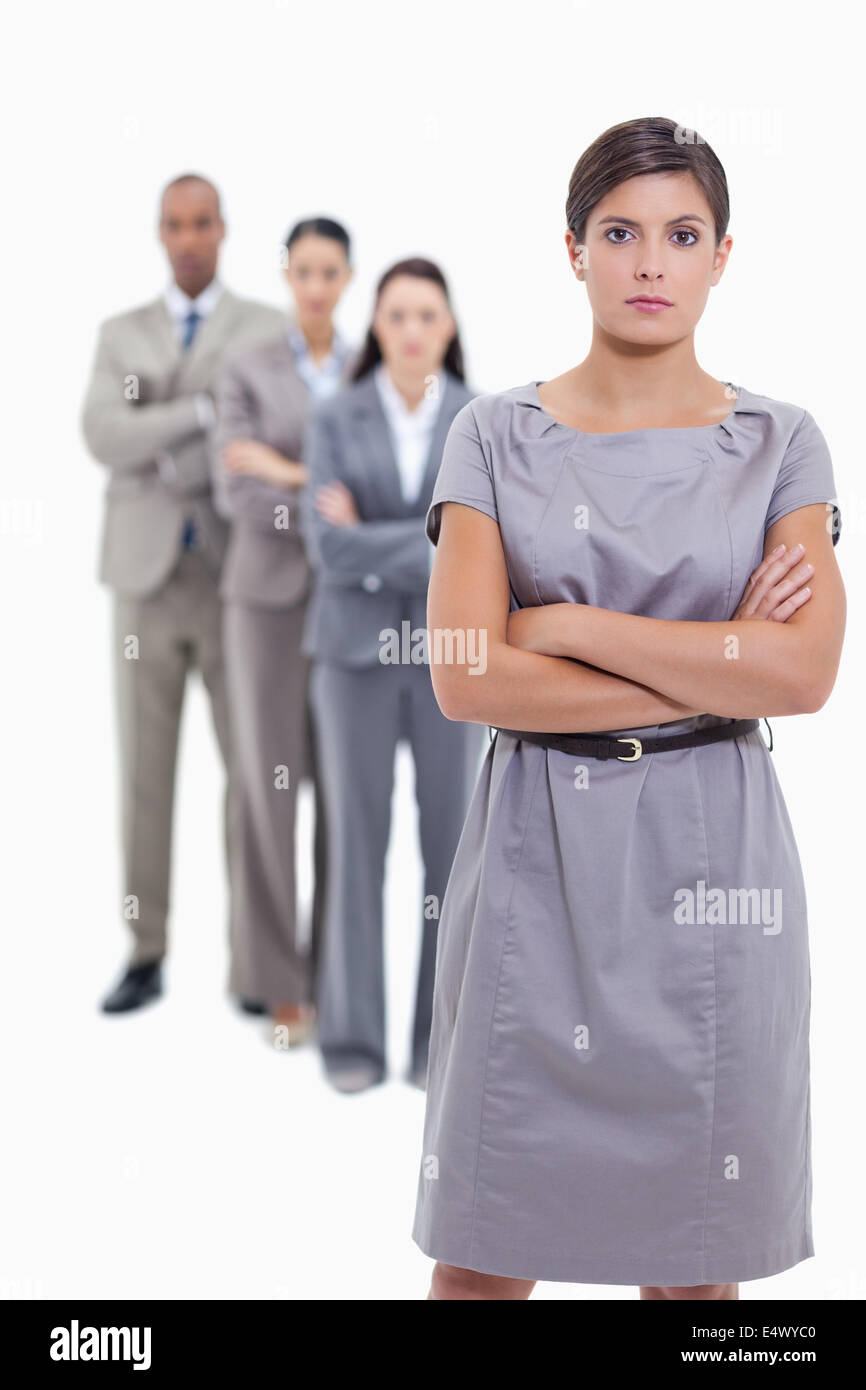Serious business team crossing their arms Stock Photo - Alamy