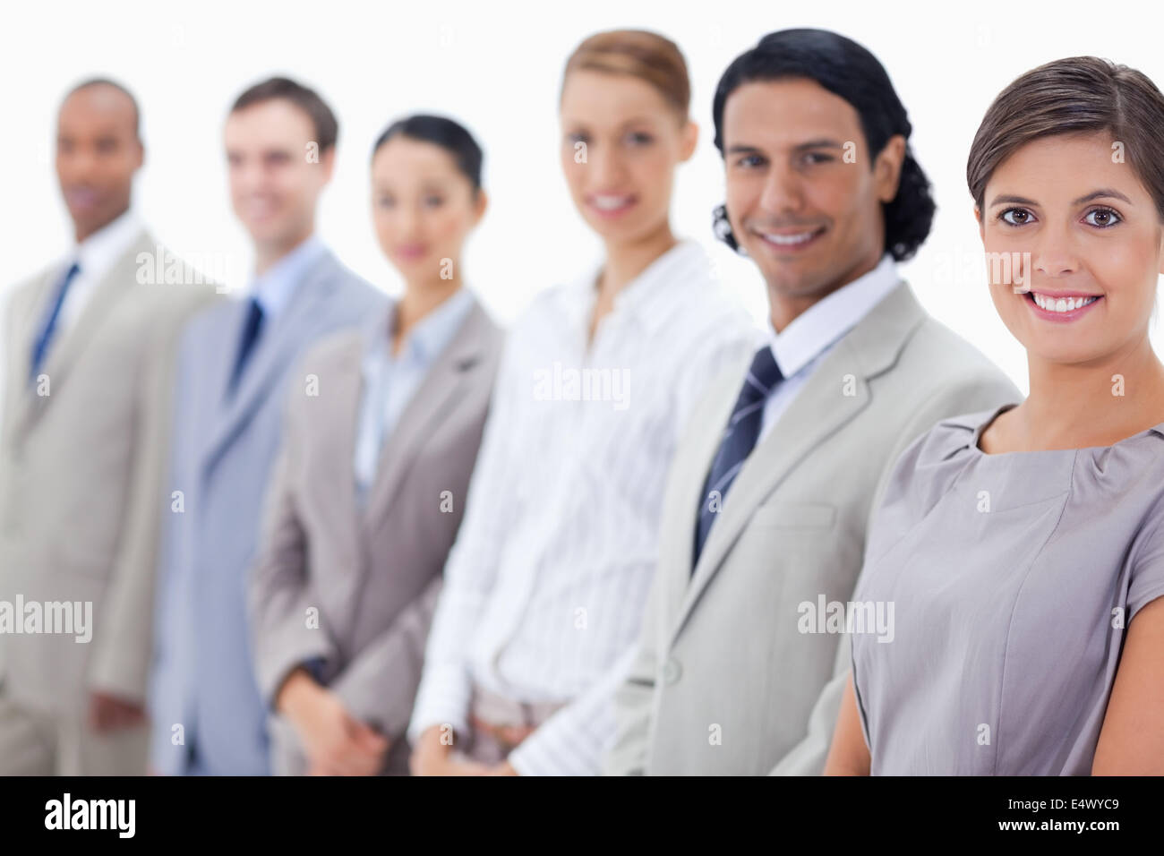 Close-up of a smiling business team Stock Photo - Alamy