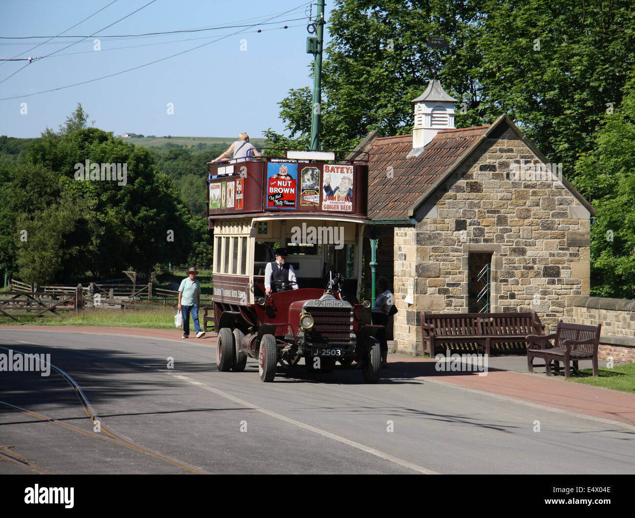 Vintage open top bus at the bus stop at Beamish Open Air Living Museum in Durham, Northumberland, UK. Stock Photo