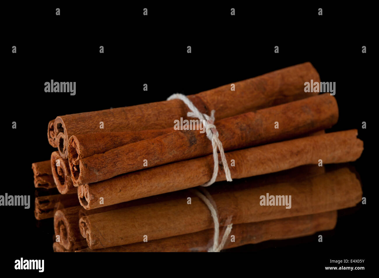 Cinnamon sticks packed together Stock Photo