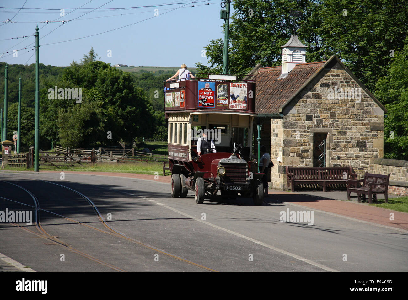 Vintage open top bus at the bus stop at Beamish Open Air Living Museum in Durham, Northumberland, UK. Stock Photo