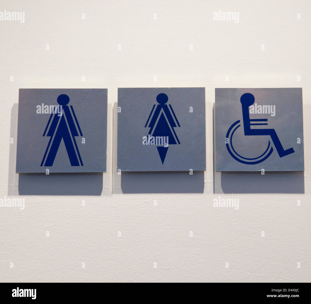 Toilet signs for men ladies and disabled people. Stock Photo