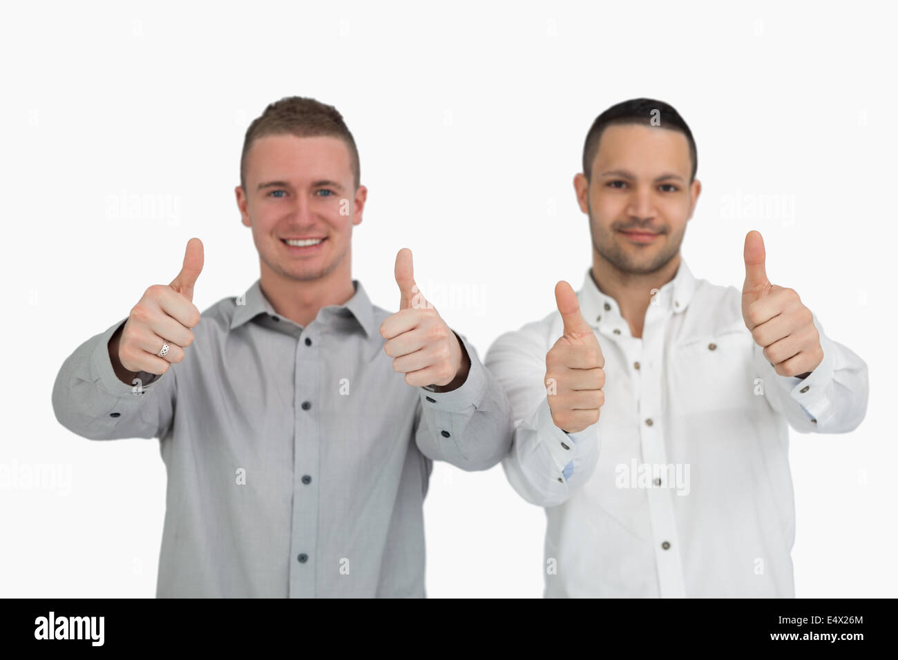 Two men putting their thumbs up Stock Photo Alamy