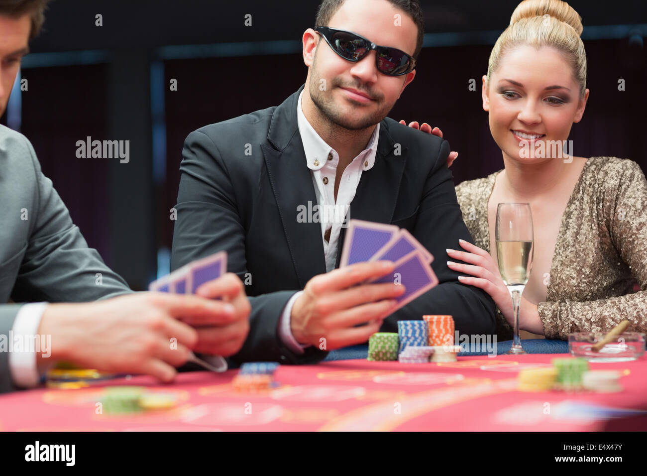Couple at the poker table Stock Photo