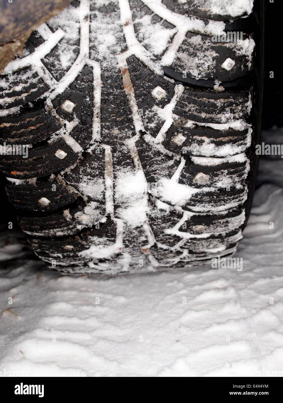 winter tire tracks in snow Stock Photo