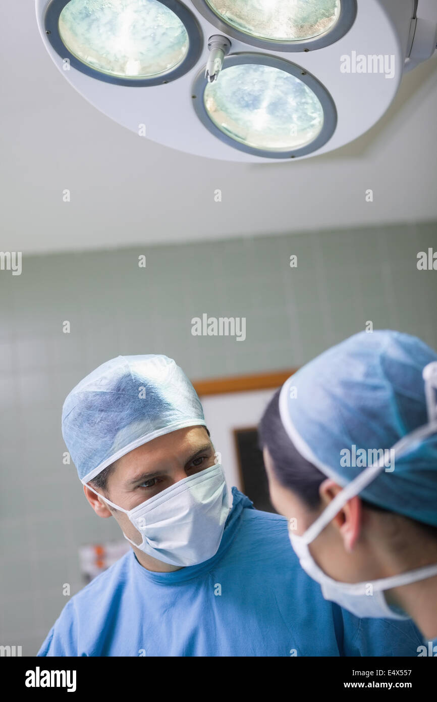 Doctor and nurse talking close hi-res stock photography and images - Alamy