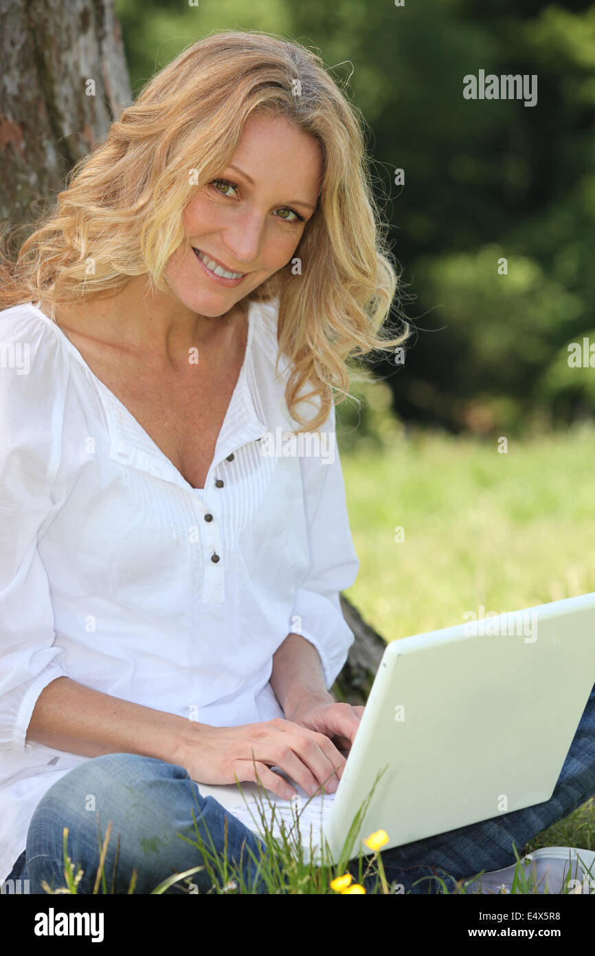 portrait of a woman with laptop Stock Photo - Alamy
