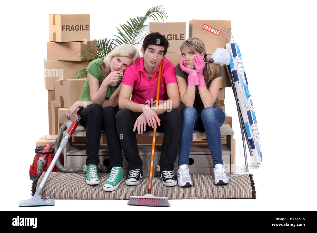 Tired roommates on moving day Stock Photo