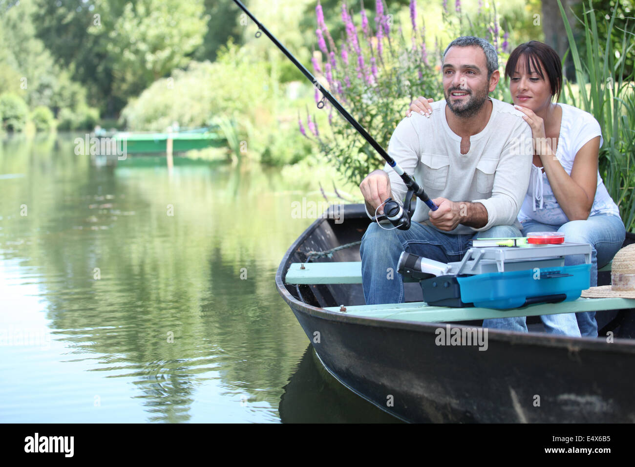 Small boat fishing in hi-res stock photography and images - Alamy