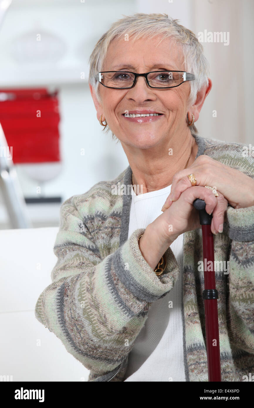 60 years old woman walking stick hi-res stock photography and images ...