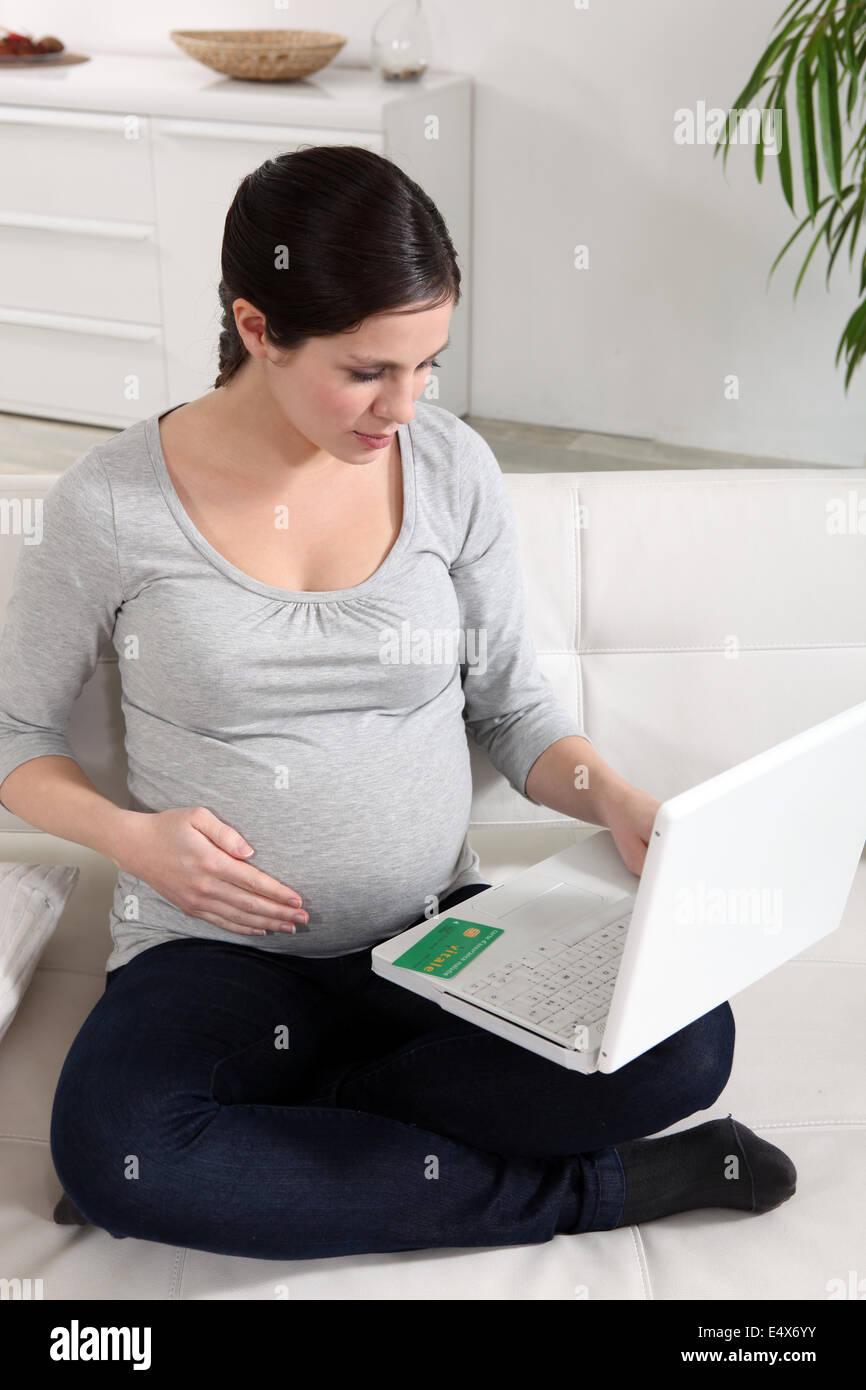Pregnant woman at a laptop Stock Photo Alamy