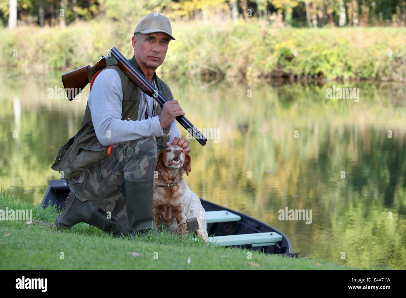 Hunter with dog Stock Photo