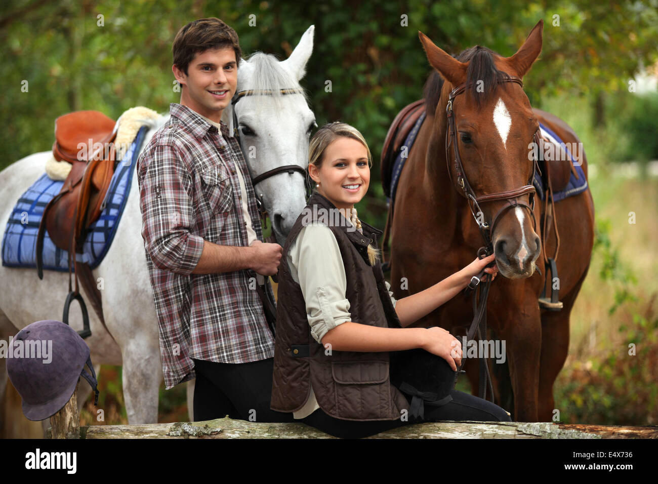 Young people horseriding Stock Photo