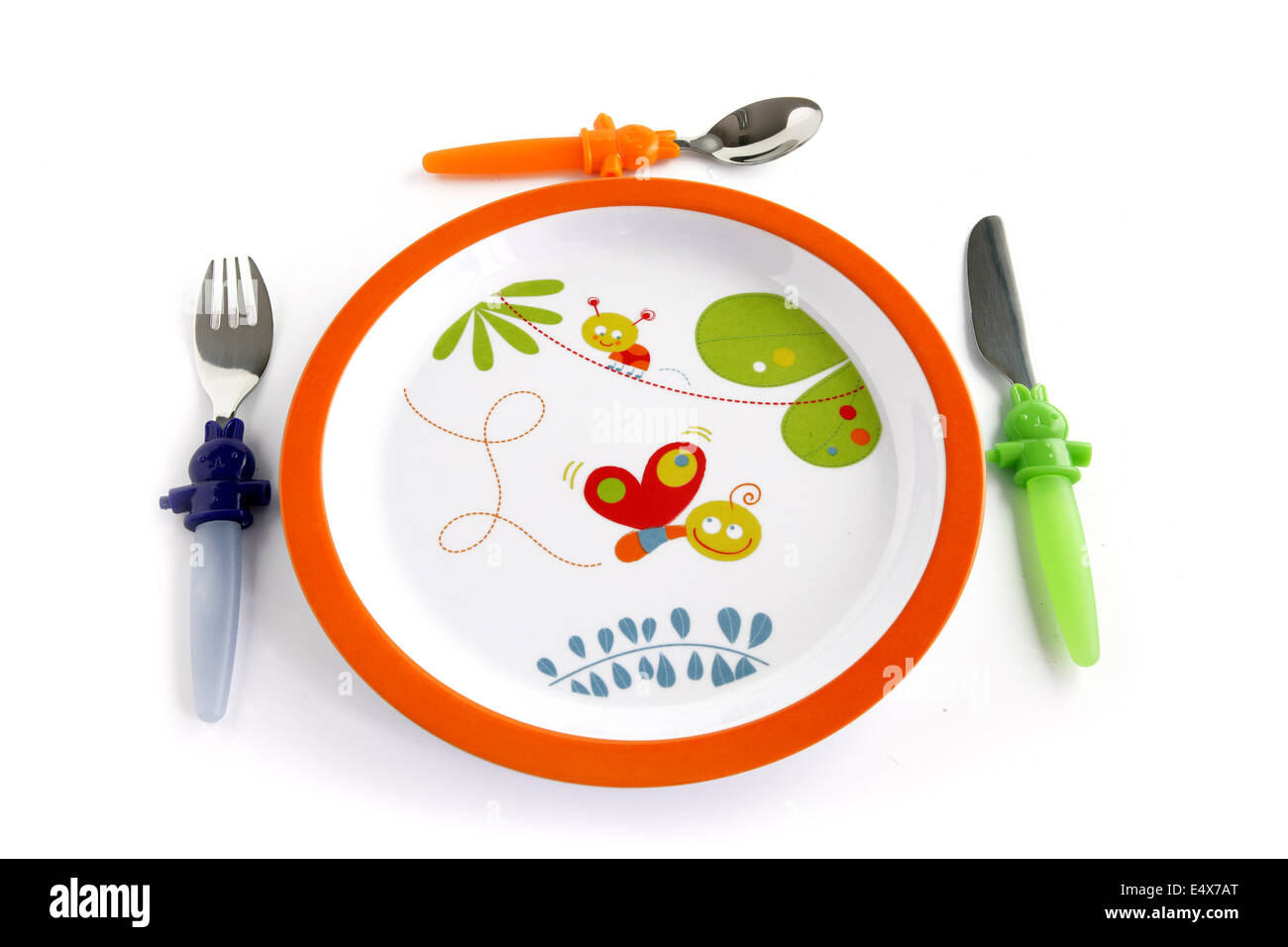 Colorful plate and cutlery for a child Stock Photo