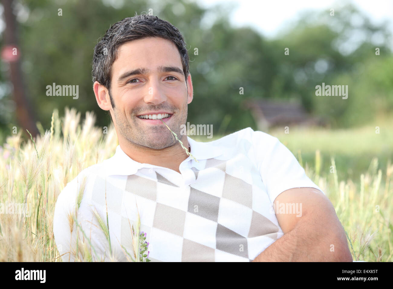 Man Lying On Grass Stock Photo Alamy