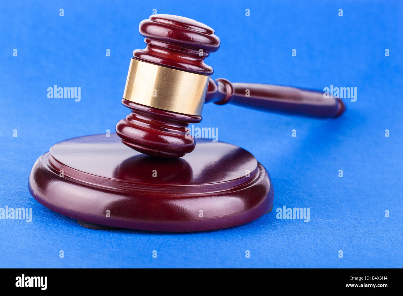 judges gavel on blue background Stock Photo