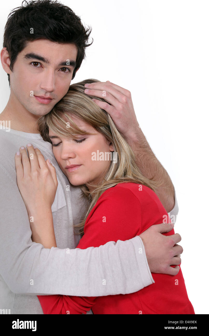 A man comforting his girlfriend Stock Photo - Alamy