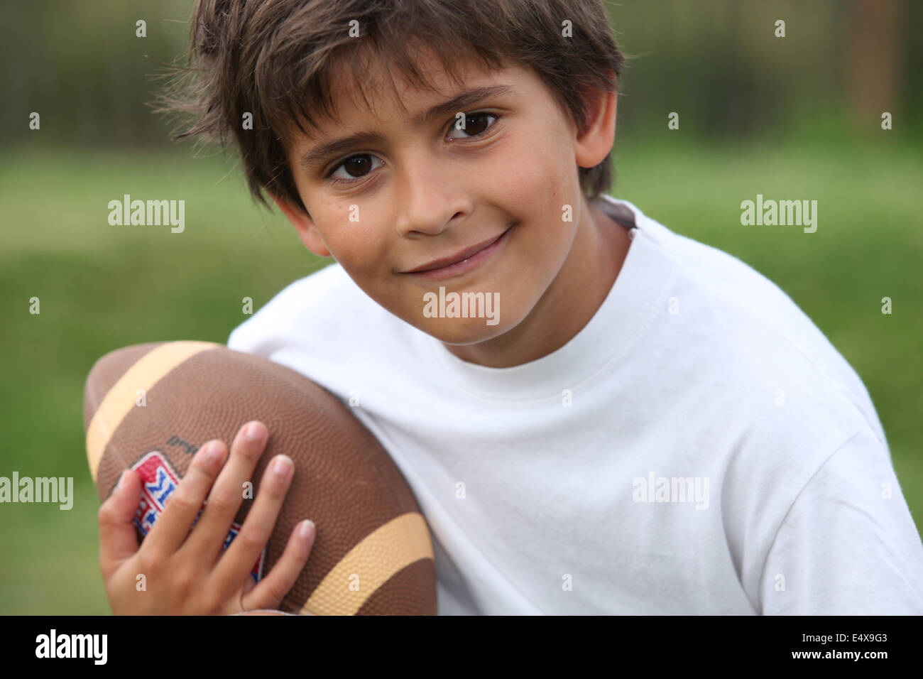 Child with rugby ball Stock Photo Alamy