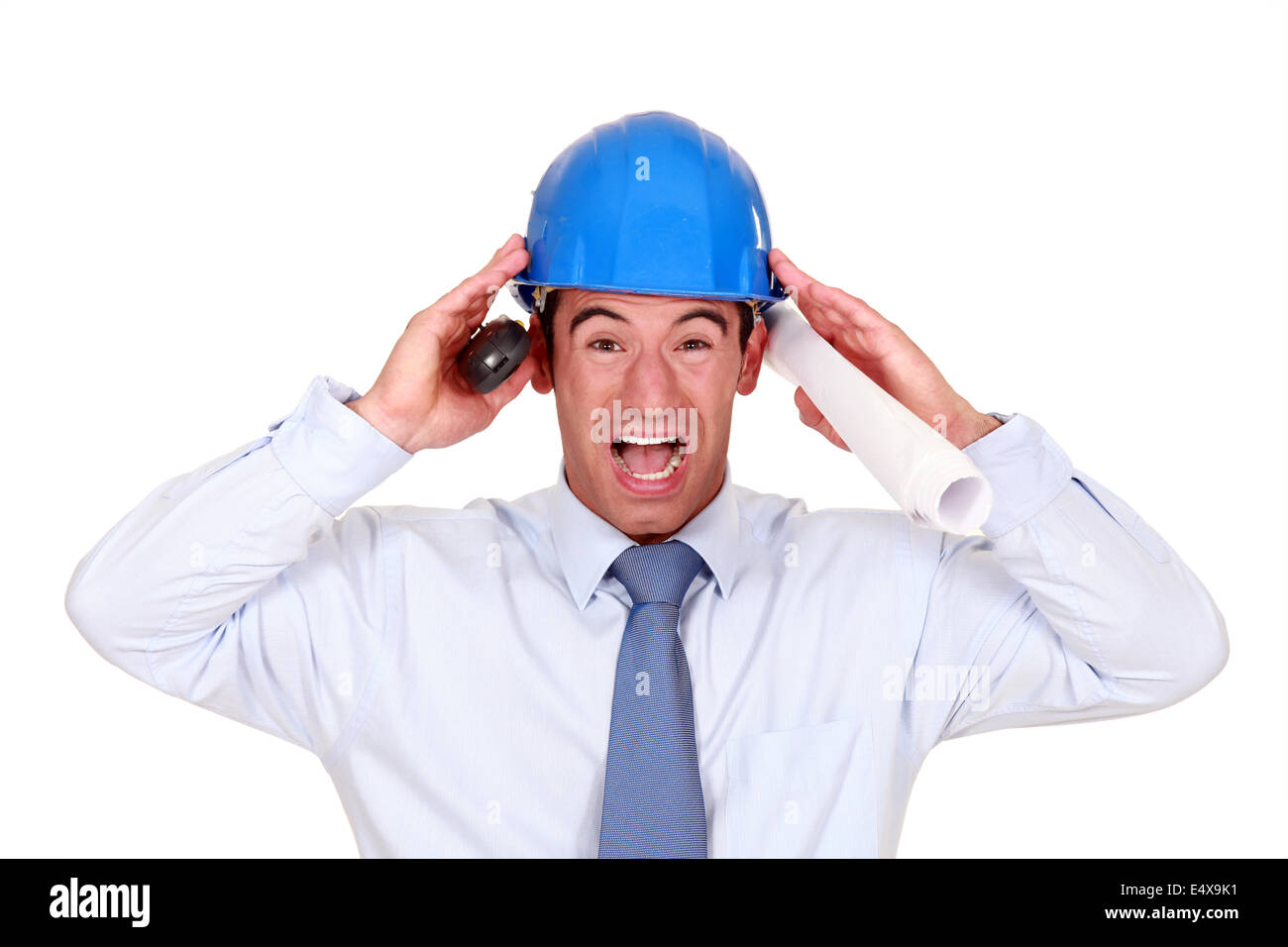 businessman with a helmet having a headache Stock Photo Alamy