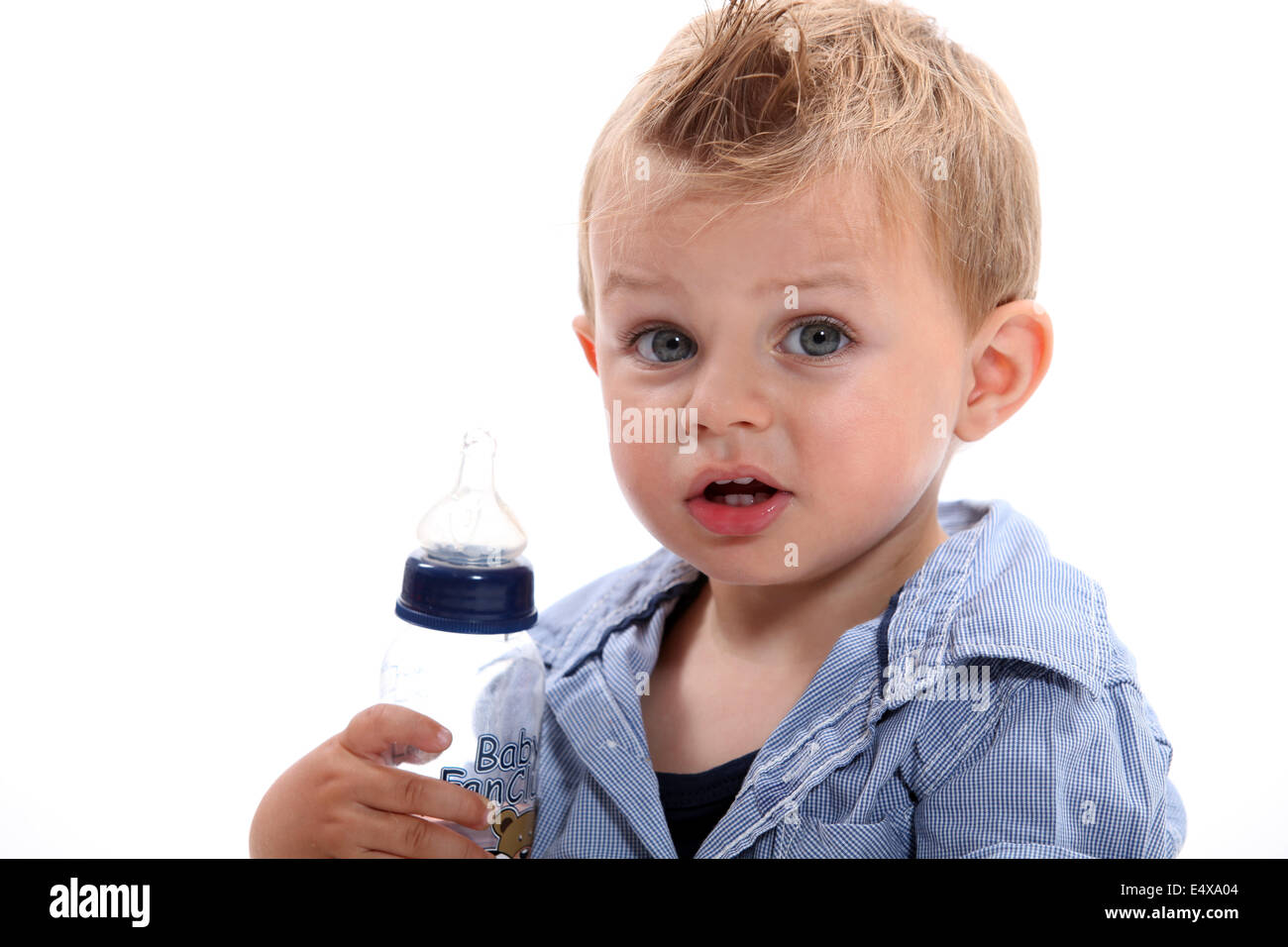 Boy holding bottle Stock Photo