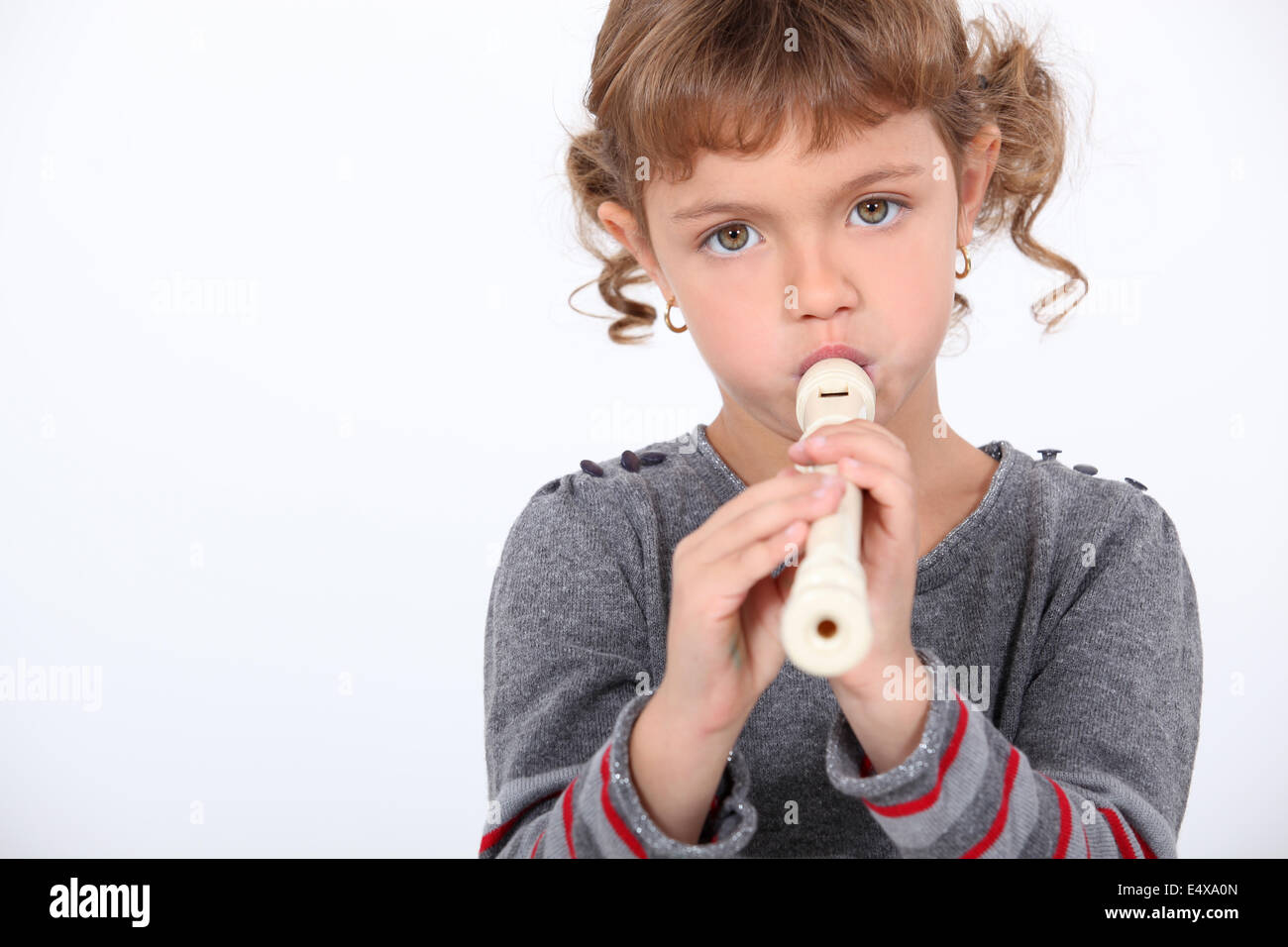 Girl playing flute Stock Photo Alamy