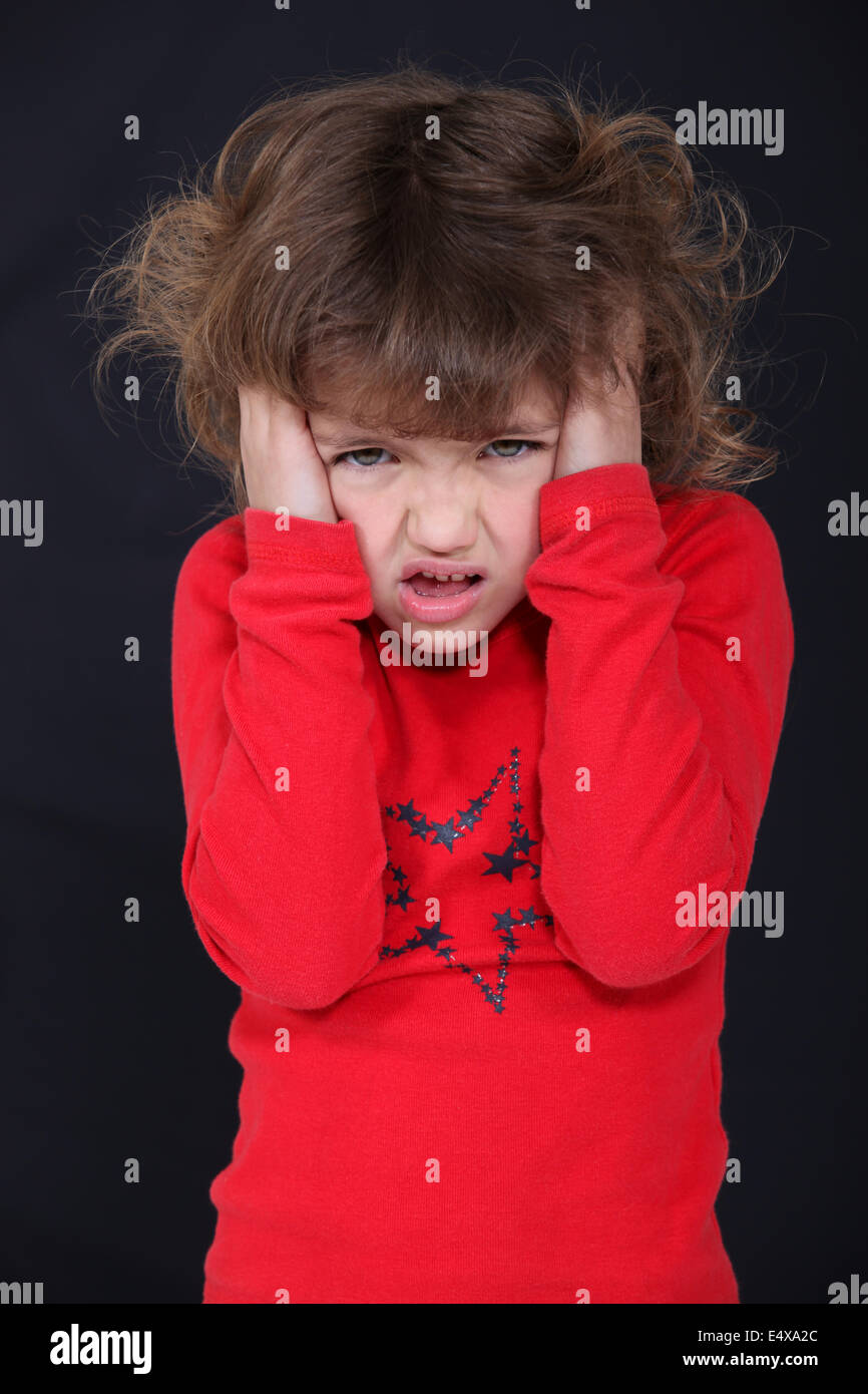 Angry little girl Stock Photo