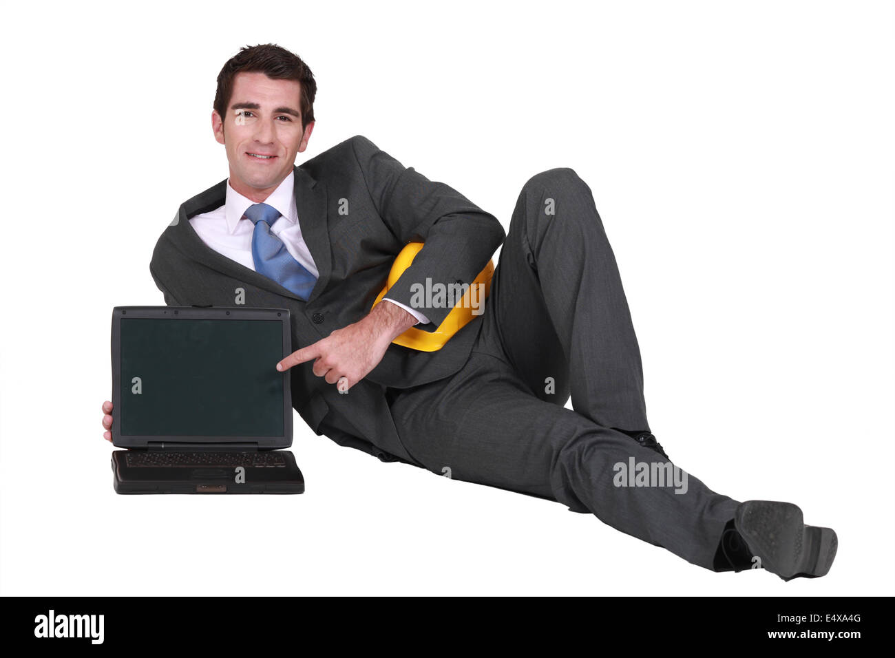 Architect with a blank laptop Stock Photo