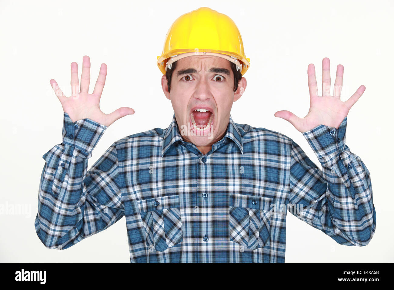 A frightened tradesman Stock Photo