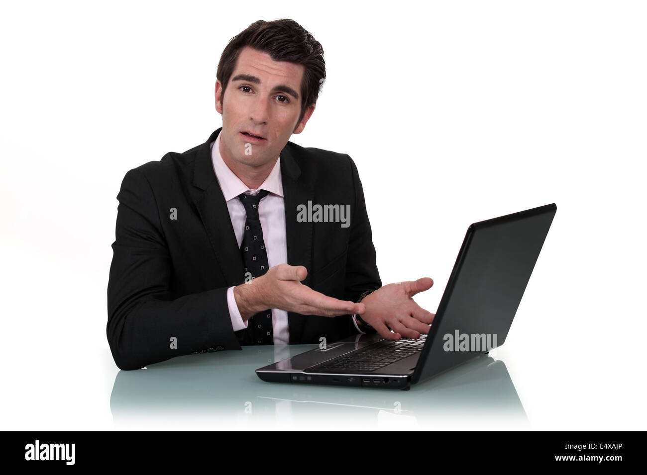 Man demonstrating a laptop Stock Photo