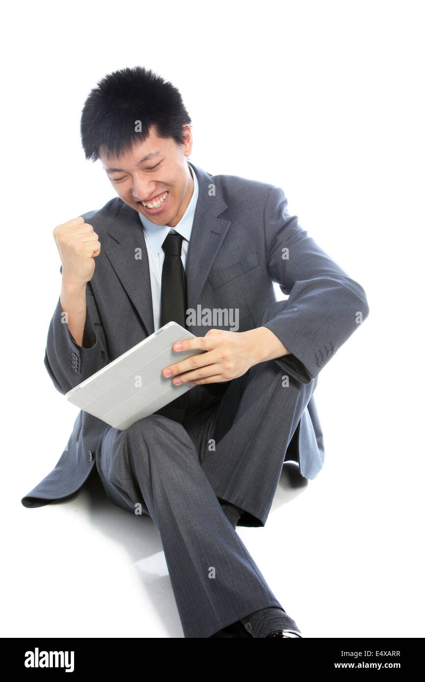 Asian businessman celebrating Stock Photo