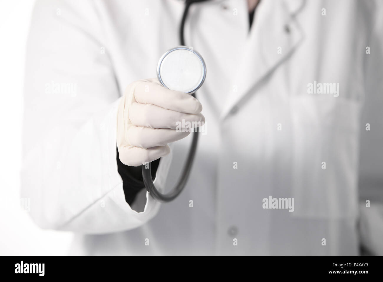 Doctor holding a stethoscope Stock Photo