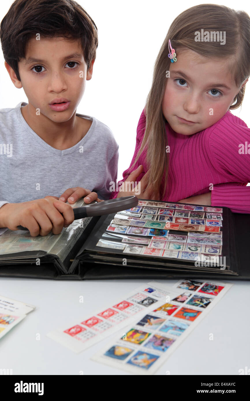 Stamp collecting boy hires stock photography and images Alamy