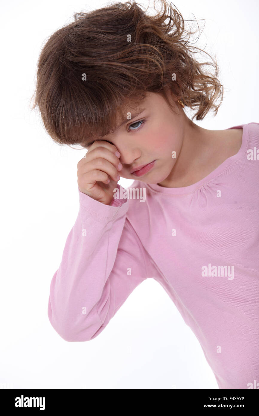 Upset little girl crying Stock Photo