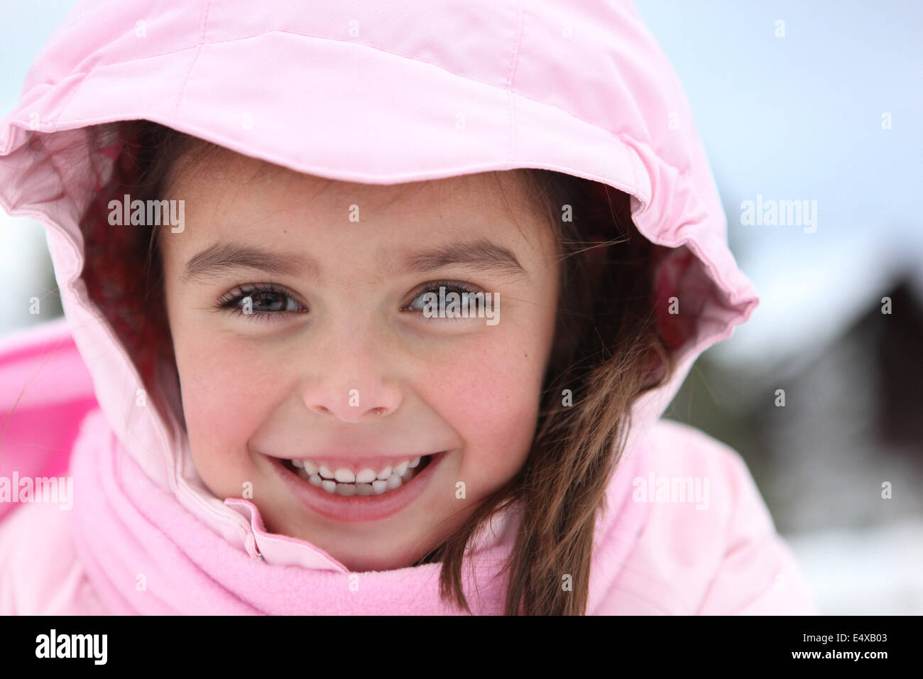 little girl wearing winter clothes Stock Photo