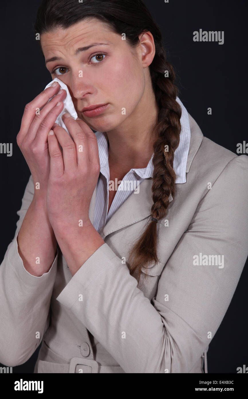 young woman shedding tears Stock Photo Alamy