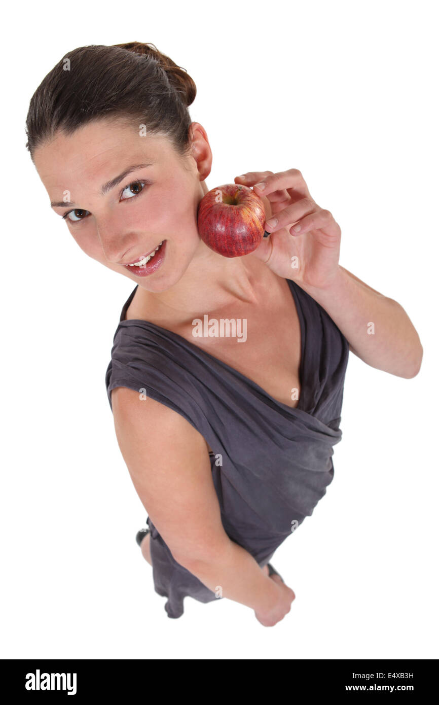 high angle shot of woman with apple Stock Photo