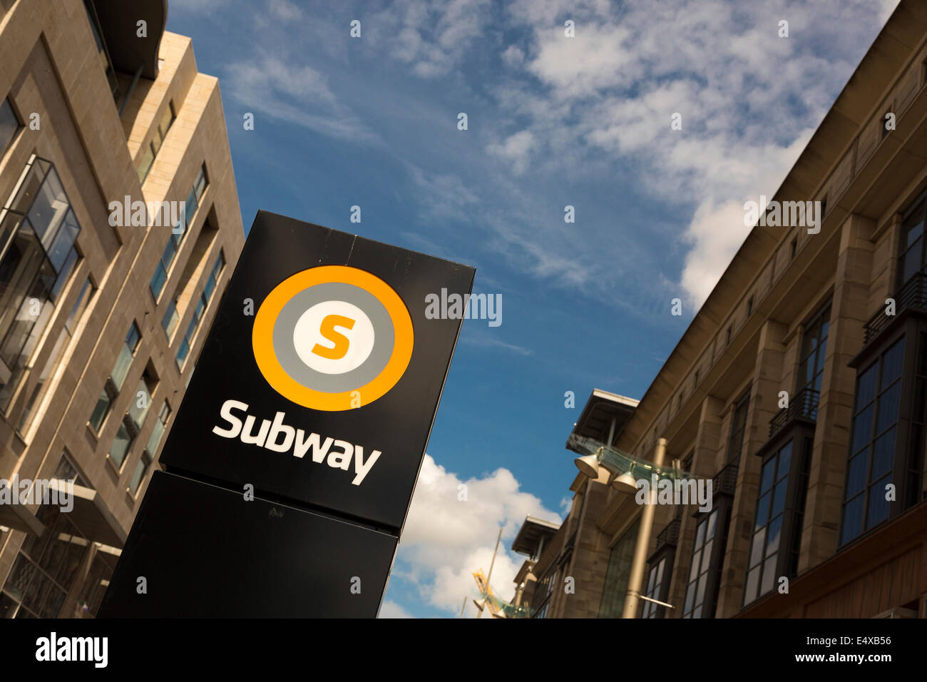 Strathclyde Passenger Transport 'SPT' Subway sign, Buchanan Street, Glasgow, Scotland. Clear sky, clouds. Stock Photo