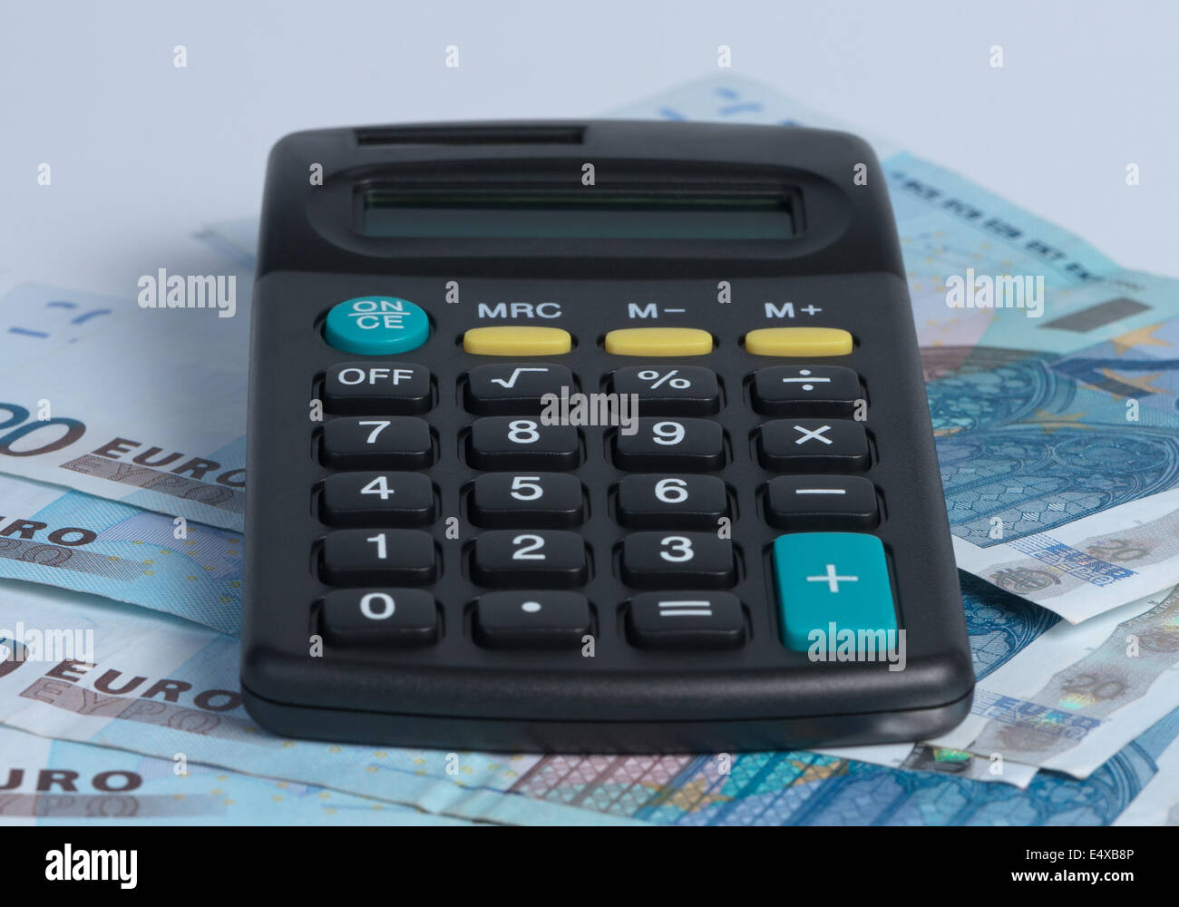 Calculator with paper money. Stock Photo