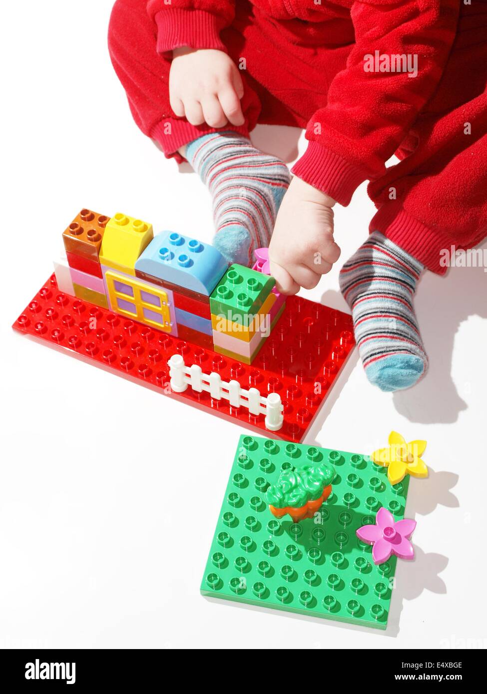 Toddler playing building toys Stock Photo Alamy