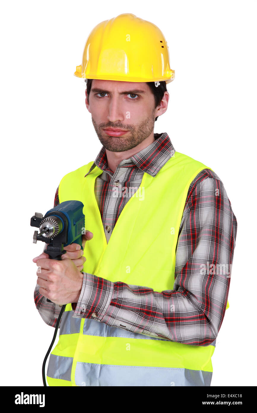 Portrait of a frowning tradesman Stock Photo