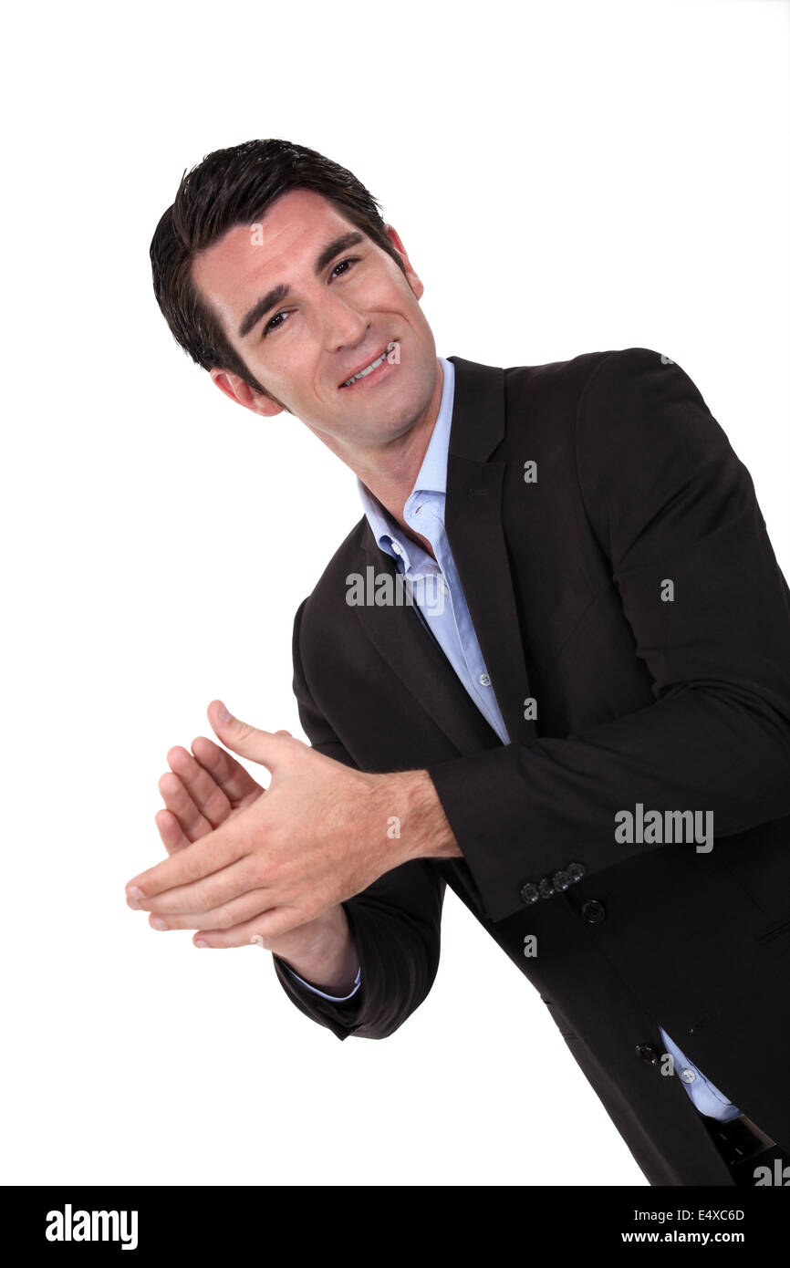 Businessman clapping Stock Photo