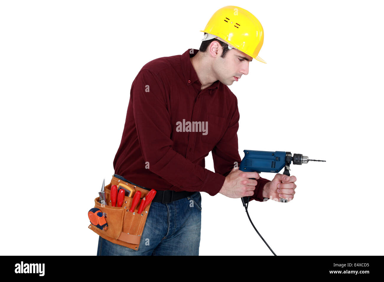 Profile shot of carpenter with power drill Stock Photo