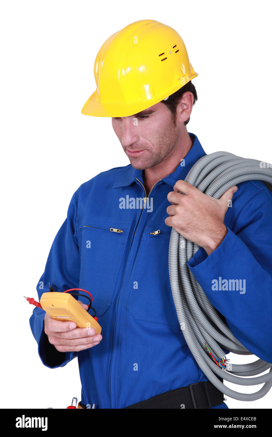 Electrician with voltmeter Stock Photo Alamy