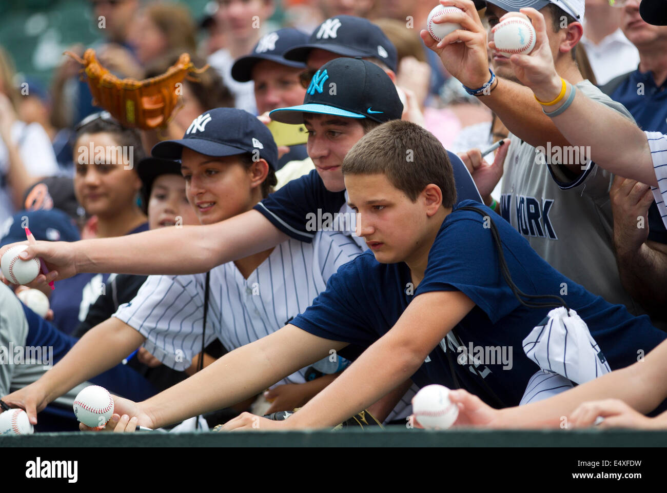 Baseball fans trying to get autographs Stock Photo Alamy