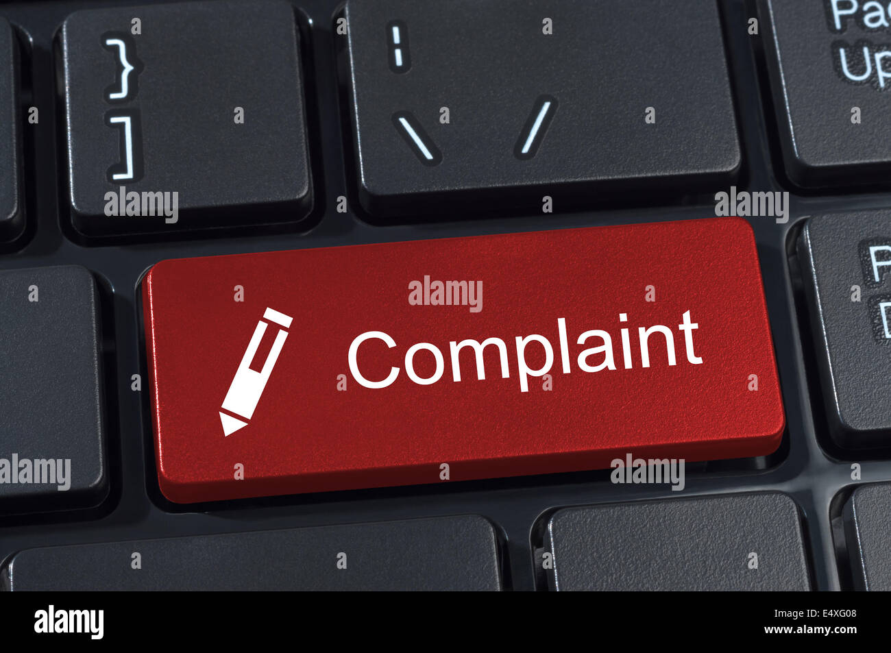 Complaint button keyboard with pen icon. Stock Photo