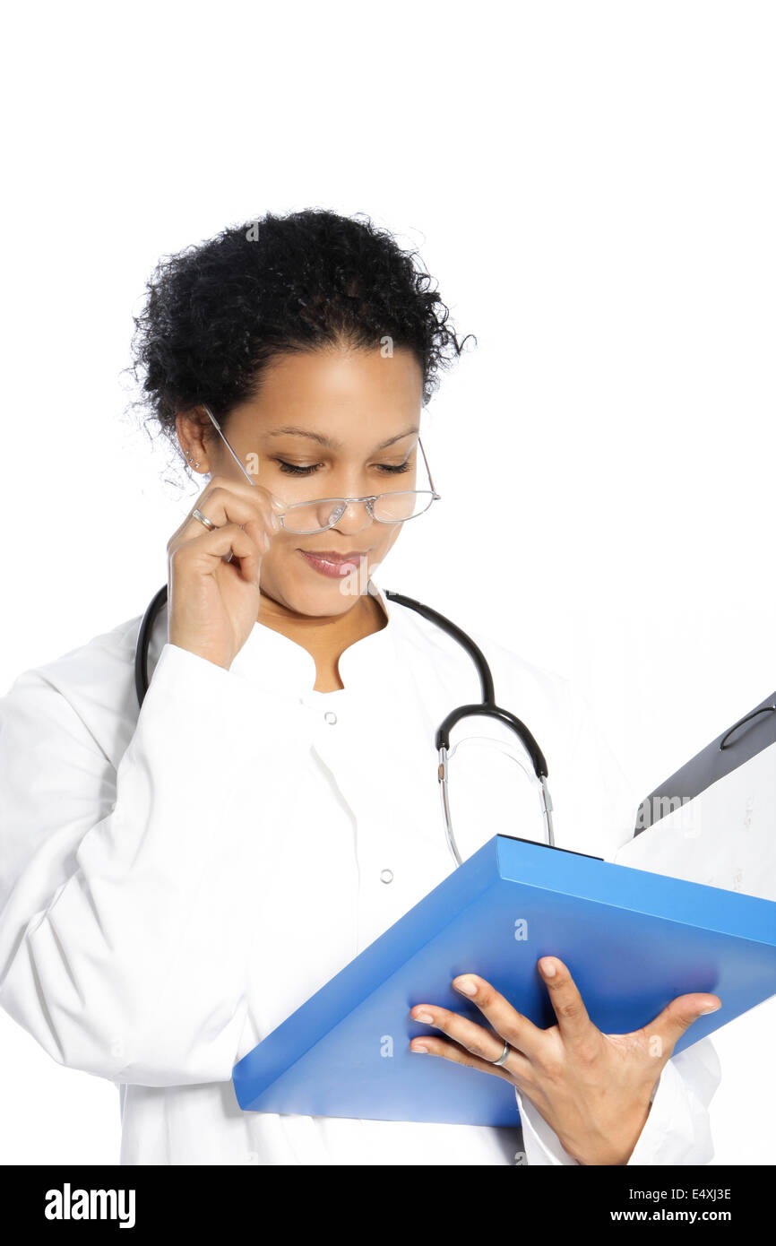 Doctor reading a patients file Stock Photo