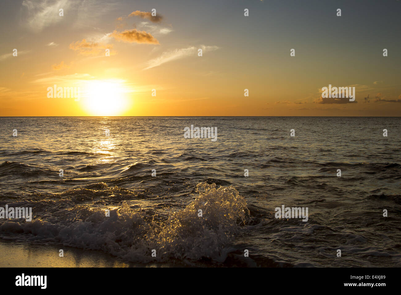 Wave splashing rock sunset hi-res stock photography and images - Alamy